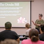 DOULA ­SESSION: Rachelle ­Friesen, co-president of the nonprofit Doulas of Rhode Island, speaks to a gathering at Landmark Medical Center in Woonsocket as part of the group’s statewide “Meet the Doulas” awareness campaign.  PBN PHOTO/­MICHAEL SALERNO