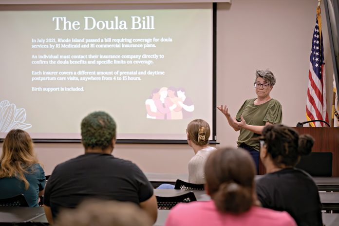 DOULA SESSION: Rachelle Friesen, co-president of the nonprofit Doulas of Rhode Island, speaks to a gathering at Landmark Medical Center in Woonsocket as part of the group’s statewide “Meet the Doulas” awareness campaign.
PBN PHOTO/MICHAEL SALERNO DOULA SESSION: Rachelle Friesen, co-president of the nonprofit Doulas of Rhode Island, speaks to a gathering at Landmark Medical Center in Woonsocket as part of the group’s statewide “Meet the Doulas” awareness campaign.
PBN PHOTO/MICHAEL SALERNO