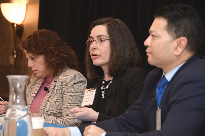 FASTER ACTION: Dr. Ana Tuya Fulton, center, chief population health officer at Care New England Health System, says she’s thankful state leaders are working on longer-term solutions for its health care problems, but there needs to be some quick wins, too. Fulton is a panelist at Providence Business News’ Health Care Summit on April 2, along with state Sen. Pamela Lauria, a nurse practitioner, left, and Dr. Raj Hazarika, vice president and chief medical officer of commercial products at Harvard Pilgrim Health Care of New England Inc.  PBN PHOTO/MIKE SKORSKI