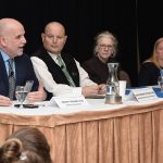 SEARCH FOR SOLUTIONS: Joseph Trunzo, left, associate director of Bryant University’s School of Health and Behavioral Sciences, participates in a panel discussion at Providence Business News’ Health Care Summit at Providence Marriott Downtown on April 2. The panel talks about ways to deal with the state’s health care woes. Also on the panel are, from left, Dr. Christopher Ottiano, interim chief medical officer and medical director at Neighborhood Health Plan of Rhode Island; Linda Hurley, CODAC Inc. CEO and president; and Meghan Grady, Meals on Wheels of RI Inc. executive director.  PBN PHOTO/MIKE SKORSKI