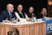 SEARCH FOR SOLUTIONS: Joseph Trunzo, left, associate director of Bryant University’s School of Health and Behavioral Sciences, participates in a panel discussion at Providence Business News’ Health Care Summit at Providence Marriott Downtown on April 2. The panel talks about ways to deal with the state’s health care woes. Also on the panel are, from left, Dr. Christopher Ottiano, interim chief medical officer and medical director at Neighborhood Health Plan of Rhode Island; Linda Hurley, CODAC Inc. CEO and president; and Meghan Grady, Meals on Wheels of RI Inc. executive director.  PBN PHOTO/MIKE SKORSKI