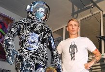 Artist Brendan Murphy unveils Love Matters sculpture in Providence ICONIC PIECE: Artist Brendan Murphy is pictured with his BOONJI astronaut, a character who launches and never returns after landing in the BOONJI galaxy. Murphy started his latest tour in Providence with his Love Matters sculptures, the first of which was unveiled April 30 at Brown University near where he grew up.
COURTESY BRENDAN MURPHY