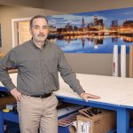TIMELY PROJECTS: Rick Goyette, owner of Allmark Signs and Graphics in Pawtucket, says the company has been handling an influx of orders from several municipalities and nonprofits related to the country’s 250th anniversary, including interpretive signs and historic district signage.  PBN PHOTO/TRACY JENKINS