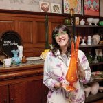 UNIQUE ITEMS: Andrea Belanger, owner of the online boutique and reseller Penny & June Vintage, holds up one of her glassware pieces. PBN PHOTO/TRACY JENKINS
