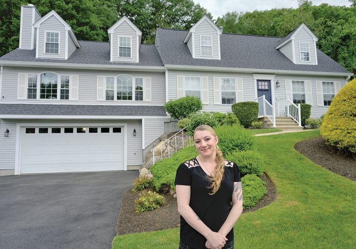 HELPING HAND: Lindsey Ricci, a real estate agent at eXp Realty LLC, says the RI AnchorHome program gives prospective homebuyers an extra boost in securing financing.  PBN PHOTO/MICHAEL SALERNO  