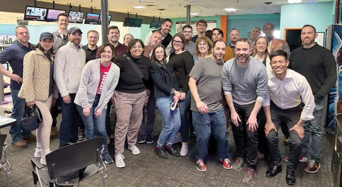 Night out: Building Enclosure Science employees organize plenty of game nights, such as this one at Lang’s Bowlarama. COURTESY BUILDING ENCLOSURE SCIENCE LLC