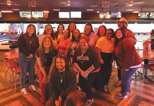 Chisholm Chisholm and Kilpatrick LTD FRIENDLY COMPETITION: Chisholm, Chisholm and Kilpatrick employees enjoy a night out on the bowling lanes.
COURTESY CHISHOLM, CHISHOLM AND PATRICK LTD.