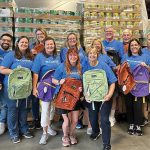 Coastal1 Credit Union WELL-SUPPLIED: As part of Coast1 Credit Union’s annual Back to School Celebration, employees distribute free backpacks to children.
COURTESY COASTAL1 CREDIT UNION