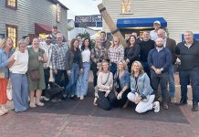 ON THE TOWN: Embrace Home Loans staff members enjoy a night out in Newport.  COURTESY EMBRACE HOME LOANS INC.