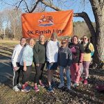 Turkey run: Greenwood employees, who receive paid time off to support nonprofits of their choice, participate in a November 5K for charity.  COURTESY GREENWOOD CREDIT UNION