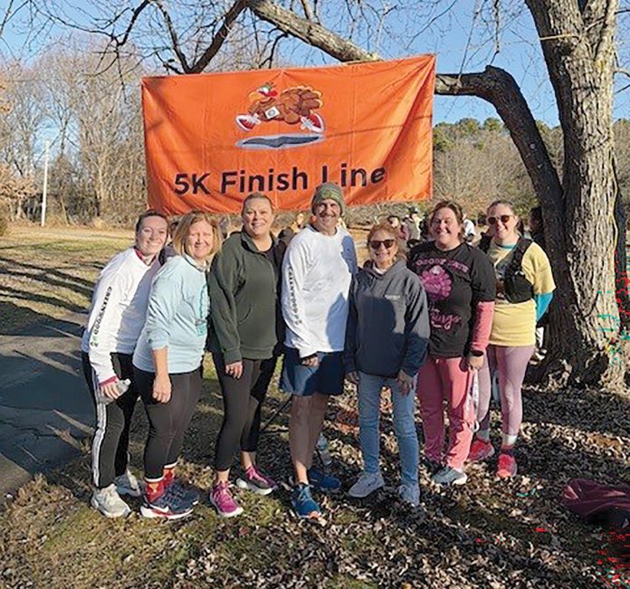 Turkey run: Greenwood employees, who receive paid time off to support nonprofits of their choice, participate in a November 5K for charity.
COURTESY GREENWOOD CREDIT UNION Turkey run: Greenwood employees, who receive paid time off to support nonprofits of their choice, participate in a November 5K for charity.
COURTESY GREENWOOD CREDIT UNION