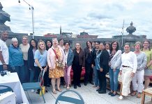 Hinckley, Allen & Snyder LLP GREAT HEIGHTS: Hinckley, Allen & Snyder employees enjoy some time together at a rooftop restaurant in Providence.
COURTESY HINCKLEY, ALLEN & SNYDER LLP