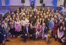 Celebrating together: The Pappas OPT Physical, Sports and Hand Therapy team celebrates accomplishments at an end of year get-together. COURTESY PAPPAS OPT PHYSICAL, SPORTS AND HAND THERAPY