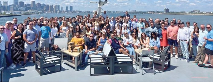 On the water: The KLR crew sets sail for their annual companywide summer outing – a day of sun and sweeping views of Boston Harbor.  COURTESY KAHN, LITWIN, RENZA & CO. LTD.