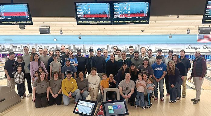 Bonding over bowling: KPMG organizes employee outings involving friendly competition.
COURTESY KPMG LLP Bonding over bowling: KPMG organizes employee outings involving friendly competition.
COURTESY KPMG LLP