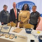 Lathrop Insurance bets on transparency, employee perks to build healthy workplace Motivated teaM: Lathrop Insurance employees at a professional event.
COURTESY LATHROP INSURANCE INC.