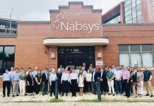 Nabsys 2.0 LLC MELDING MINDS: Nabsys employees and Hitachi colleagues gather at Providence headquarters following Hitachi High-Tech Corp.’s acquisition of a majority interest in Nabsys.
COURTESY NABSYS 2.0 LLC