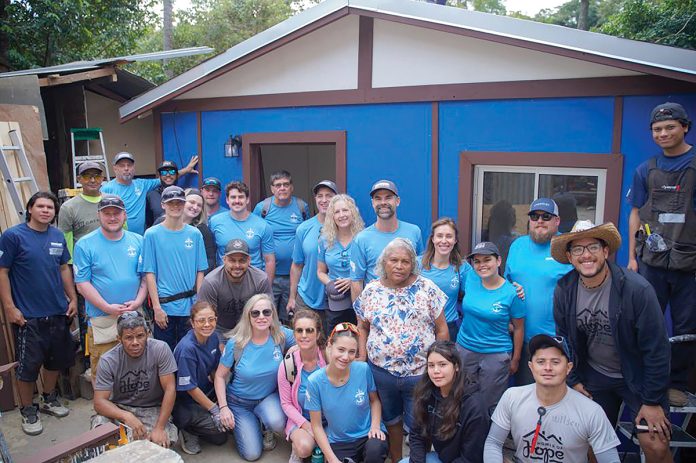 HOMEMAKERS: Pariseault employees participate in a project alongside nonprofit Building Hope.
COURTESY PARISEAULT BUILDERS INC. HOMEMAKERS: Pariseault employees participate in a project alongside nonprofit Building Hope.
COURTESY PARISEAULT BUILDERS INC.