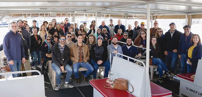 In the same boat: Providence Mutual organizes employee outings about two to three times per year, including this boat cruise.  COURTESY THE PROVIDENCE MUTUAL FIRE INSURANCE CO.
