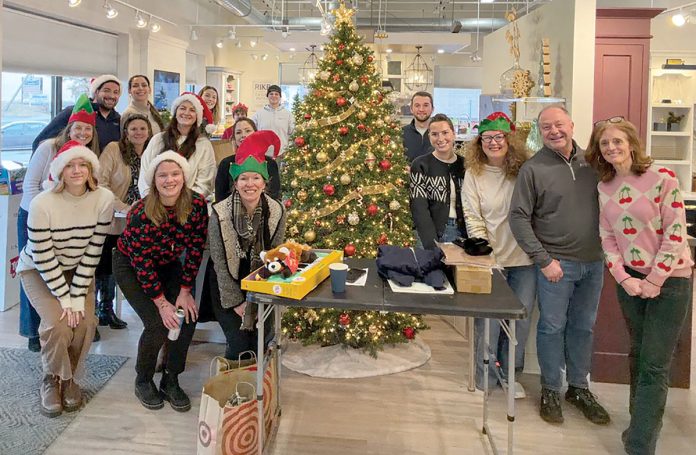 A JOLLY TIME: RIKB staff members gather around the tree at the company holiday party.
COURTESY RIKB DESIGN BUILD A JOLLY TIME: RIKB staff members gather around the tree at the company holiday party.
COURTESY RIKB DESIGN BUILD