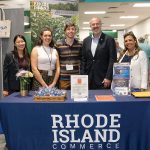R.I. Commerce Corp. OUT AND ABOUT: R.I. Commerce Corp. employees, including Commerce Secretary Stefan Pryor, second from right, staff a table at the Table Top Show in April at Farm Fresh Rhode Island.
COURTESY R.I. COMMERCE CORP.