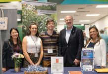 R.I. Commerce Corp. OUT AND ABOUT: R.I. Commerce Corp. employees, including Commerce Secretary Stefan Pryor, second from right, staff a table at the Table Top Show in April at Farm Fresh Rhode Island.
COURTESY R.I. COMMERCE CORP.