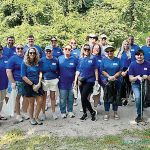 USI Insurance Services DRESSING THE PART: USI Insurance Services employees don matching T-shirts when regularly volunteering with nonprofits as part of the USI Gives Back program.
COURTESY USI INSURANCE SERVICES LLC