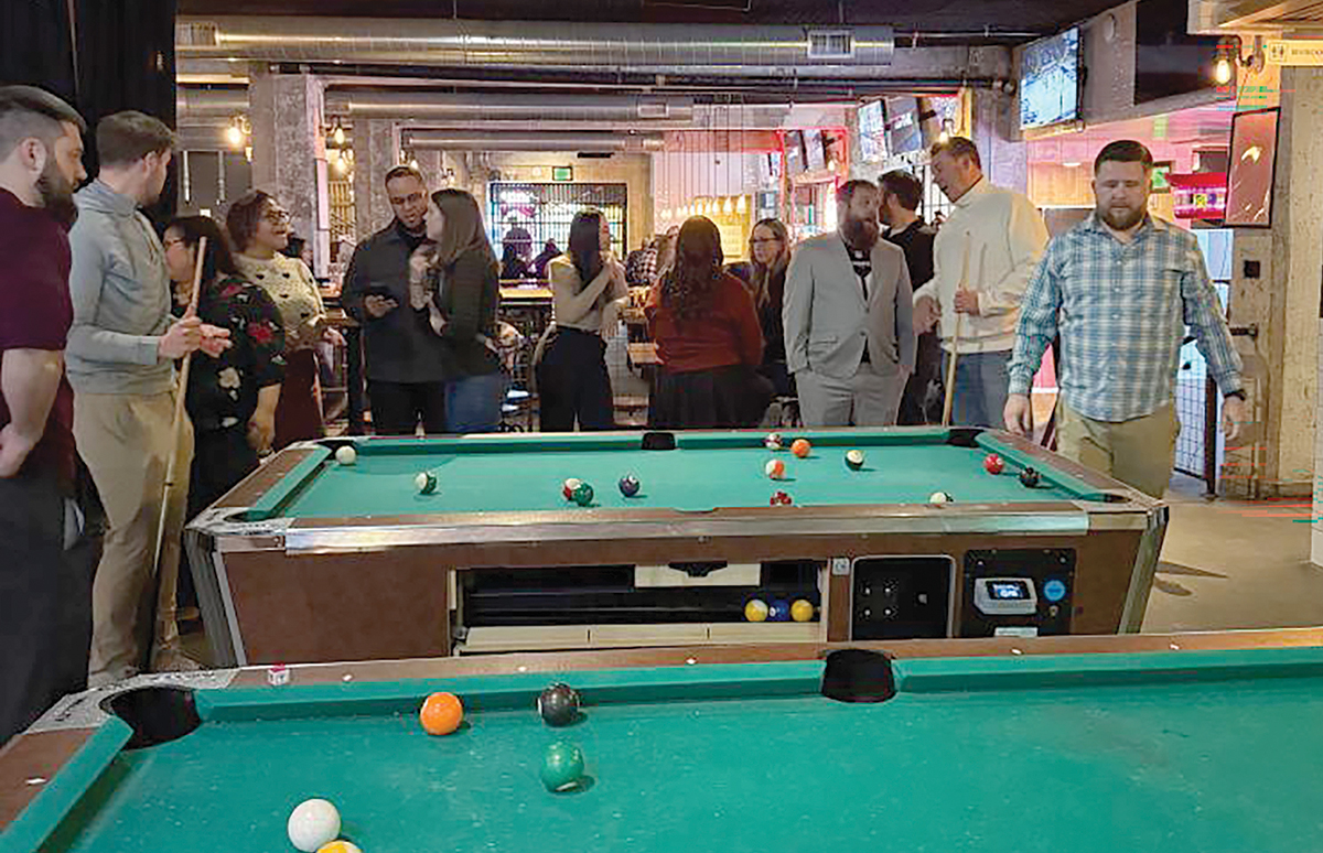 Pool night: Vertikal 6 employees enjoy a night playing billiards.
COURTESY VERTIKAL6 INC. Pool night: Vertikal 6 employees enjoy a night playing billiards.
COURTESY VERTIKAL6 INC.