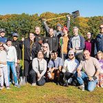 igus, Inc. Shovel ready: Igus employees are out in force for an outdoor community service project.
COURTESY IGUS INC.