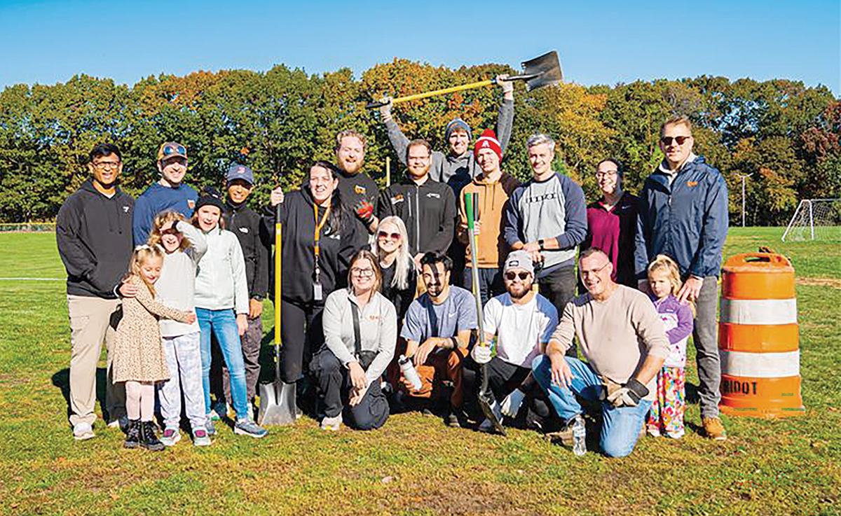 Shovel ready: Igus employees are out in force for an outdoor community service project.
COURTESY IGUS INC. Shovel ready: Igus employees are out in force for an outdoor community service project.
COURTESY IGUS INC.