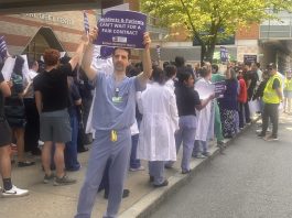 At hospitals, both management and residents feeling financial woes INTERNS AND RESIDENTS represented by the Committee of Interns and Residents rallied outside Rhode Island Hospital on June 5 as the union attempts to negotiate its first contract with Brown University Health. / PBN FILE PHOTO/CHRISTOPHER ALLEN