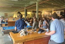 SUMMER SOCIALIZING: Local business professionals gather at Whalers Brewing Co. in South Kingstown for one of the Southern Rhode Island Chamber of Commerce’s Statewide Summer Social events in partnership with the Southern Rhode Island Young Professionals. This year’s event will be held July 9 at Whalers Brewing.  COURTESY SOUTHERN RHODE ISLAND YOUNG PROFESSIONALS