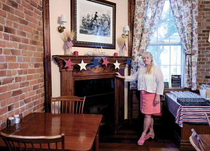 INN THE KNOW: Monica Hopton has owned and operated the Christopher Dodge House, a 14-room bed-and-breakfast in Providence, since 2002. PBN PHOTO/­MICHAEL SALERNO