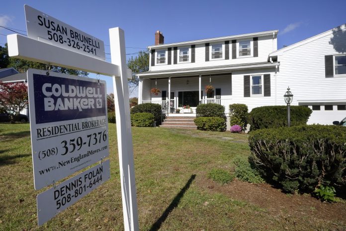 Existing Home Sales THE MEDIAN sale price of single-family homes in Rhode Island was $550,000 in June, 5.8% higher than a year ago, the Rhode Island Association of Realtors says. / AP FILE PHOTO/ROGELIO V. SOLIS