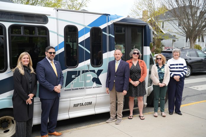 STANDING IN front of a Flex van from left are Erin Donovan-Boyle, CEO and president of the Greater Newport Chamber of Commerce; Christopher Durand, R.I. Public Transit Authority CEO; Sen. Louis P. DiPalma, D-Middletown; Sen. Dawn Euer, D-Newport; Rep. Terri Cortvriend, D-Middletown; and Mary A. McDowell, Portsmouth Town Council member. RIPTA on Wednesday extended its Flex On Demand service in the north part of Aquidneck Island through Dec. 31. / COURTESY R.I. PUBLIC TRANSIT AUTHORITY