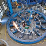 MAKING SPARKS FLY: ­Mechanics work in one of Electric Boat’s metal fabrication “fixtures” used to build frames that reinforce a submarine’s ­pressure hull.  COURTESY ­GENERAL  DYNAMICS ­ELECTRIC BOAT