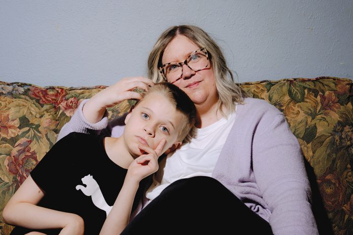 UP FOR A FIGHT: Lindsey Althaus and her son, Whitman Althaus, 12, who has autism and a neurological disorder called apraxia, in their home on July 1 in Luckey, Ohio.
AP PHOTO/NIC ANTAYA UP FOR A FIGHT: Lindsey Althaus and her son, Whitman Althaus, 12, who has autism and a neurological disorder called apraxia, in their home on July 1 in Luckey, Ohio.
AP PHOTO/NIC ANTAYA