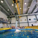 POOL PARTY: Rubber duckies are dropped into the test tank at the University of Rhode Island’s new Ocean Robotics Laboratory at an underwater ribbon cutting in June.  COURTESY UNIVERSITY OF RHODE ISLAND/MICHAEL SALERNO
