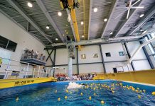 URI’s ocean robotics hub feeds wave of innovation POOL PARTY: Rubber duckies are dropped into the test tank at the University of Rhode Island’s new Ocean Robotics Laboratory at an underwater ribbon cutting in June.
COURTESY UNIVERSITY OF RHODE ISLAND/MICHAEL SALERNO
