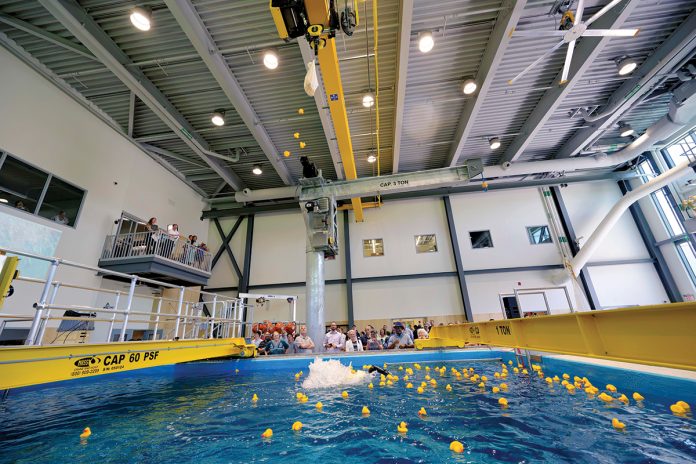 POOL PARTY: Rubber duckies are dropped into the test tank at the University of Rhode Island’s new Ocean Robotics Laboratory at an underwater ribbon cutting in June.
COURTESY UNIVERSITY OF RHODE ISLAND/MICHAEL SALERNO POOL PARTY: Rubber duckies are dropped into the test tank at the University of Rhode Island’s new Ocean Robotics Laboratory at an underwater ribbon cutting in June.
COURTESY UNIVERSITY OF RHODE ISLAND/MICHAEL SALERNO