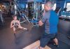 TIGHT GRIP: Joe Depena, owner and fitness manager at VP Fitness on Dorrance Street in Providence, works with his ­client, Alice Negrao, of Providence, in 2018.  PBN FILE  PHOTO/MICHAEL SALERNO
