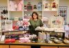 Baldomar created Rhody apparel company to honor her late husband TAKE A LOOK: Paola Baldomar, owner of online apparel brand Rhody & Co., displays items at a pop-up at Providence Place mall.
PBN PHOTO/MICHAEL SALERNO