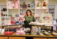 Baldomar created Rhody apparel company to honor her late husband TAKE A LOOK: Paola Baldomar, owner of online apparel brand Rhody & Co., displays items at a pop-up at Providence Place mall.
PBN PHOTO/MICHAEL SALERNO