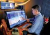 A SOUND BUSINESS PLAN: Mark Scetta, owner of Stellar Audio Forensics LLC in Providence, with the equipment he uses to analyze sound recordings for legal cases and other matters.  PBN PHOTO/MICHAEL SALERNO