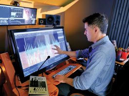 Forensic audio analysts still thrive in AI world A SOUND BUSINESS PLAN: Mark Scetta, owner of Stellar Audio Forensics LLC in Providence, with the equipment he uses to analyze sound recordings for legal cases and other matters.
PBN PHOTO/MICHAEL SALERNO