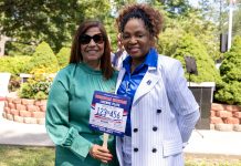 PROVIDENCE DEMOCRATS Sen. Ana Quezada, left, and Rep. Grace Diaz at the ceremonial bill signing of legislation creating a license plate honoring Dominican culture on Aug. 14 at Roger Williams Park. The legislators introduced the bills to the General Assembly to establish the new license plates. / COURTESY R.I. GENERAL ASSEMBLY
