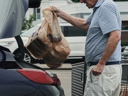 Inflation cooled last month as gas prices fell, though costs remain elevated