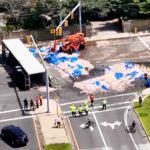 Truckload of squid spills into the street in Narragansett, creating a smelly mess