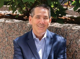 Leading With Empathy: Patrick LeBeau, executive director and financial adviser at Morgan Stanley Wealth Management, blends decades guiding clients with volunteer leadership at Roger Williams Park Zoo and Foster Forward.  PBN PHOTO/STEPHANIE BERNABA