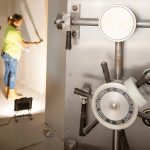 Banks adjust as borrowing costs climb MOVING IN:
Construction worker Fabiola Roman installs drywall at a new Bank Rhode Island branch in Newport in 2023. The bank is now called Beacon Bank. Several smaller banks expanded their branch networks in Rhode Island over the last five years, while bigger financial institutions shuttered some of their branches.
PBN FILE PHOTO/DAVID HANSEN
